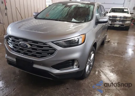 2022 Ford Edge Titanium z USA, uszkodzony, nr VIN 2FMPK4K91NBB07393